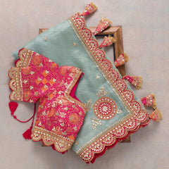 Attractive Peach Rangoli Silk Saree With Designer Fancy Readymade Blouse.